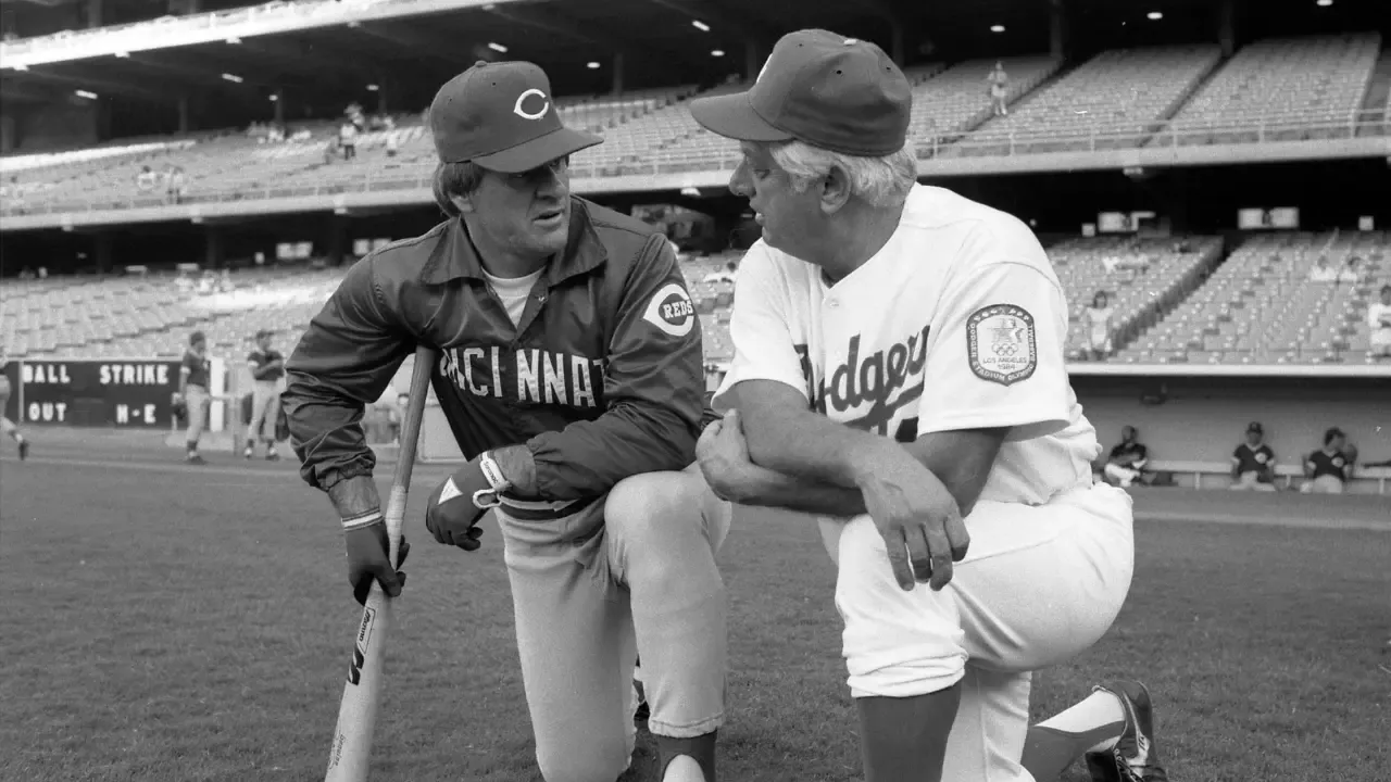 Pete Rose and Tommy Lasorda on the field